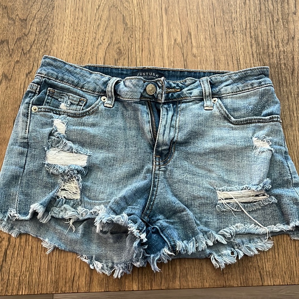 Distressed denim shorts
